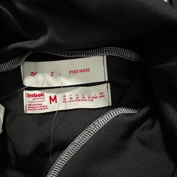 NWT Pyer Moss x Reebok Cropped Logo Black Turtleneck Embroidered Mock Tee Top - Picture 8 of 9
